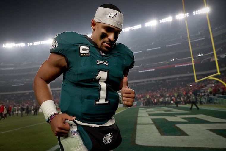 Eagles quarterback Jalen Hurts jogs off the field after the 42-19 loss to the 49ers at Lincoln Financial Field.