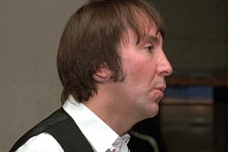 FILE - In this Aug. 29,1998 file photo showing Doug Fieger, lead singer of the pop group "The Knack," in Detroit. Fieger, leader of the power pop band The Knack who sang on the 1979 hit "My Sharona," has died. He was 57. (AP Photo/Paul Warner,File)