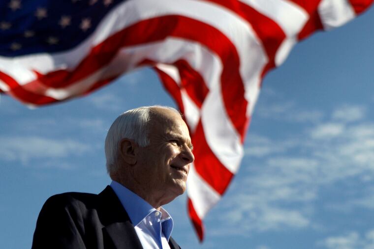 FILE - In this Nov. 3, 208 file photo, Republican presidential candidate Sen. John McCain, R-Ariz. speaks at a rally outside Raymond James Stadium in Tampa, Fla. President Donald Trump is not backing down from his longstanding criticism of the late Sen. John McCain. Trump declared Tuesday at the White House: “I was never a fan of John McCain and I never will be.” Trump drew criticism over the weekend for tweeting insults at McCain, a Vietnam war hero, Arizona senator and 2008 Republican presidential candidate who died last year of brain cancer. (AP Photo/Carolyn Kaster)