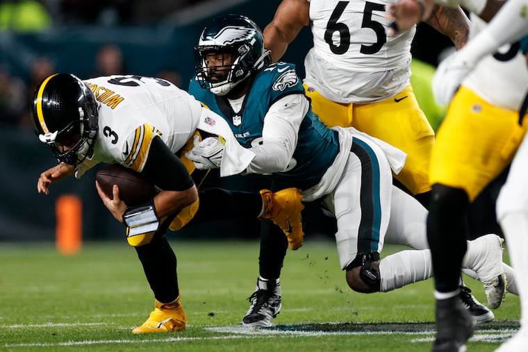 Eagles edge rusher Josh Sweat sacks Pittsburgh Steelers quarterback Russell Wilson on Dec. 15.