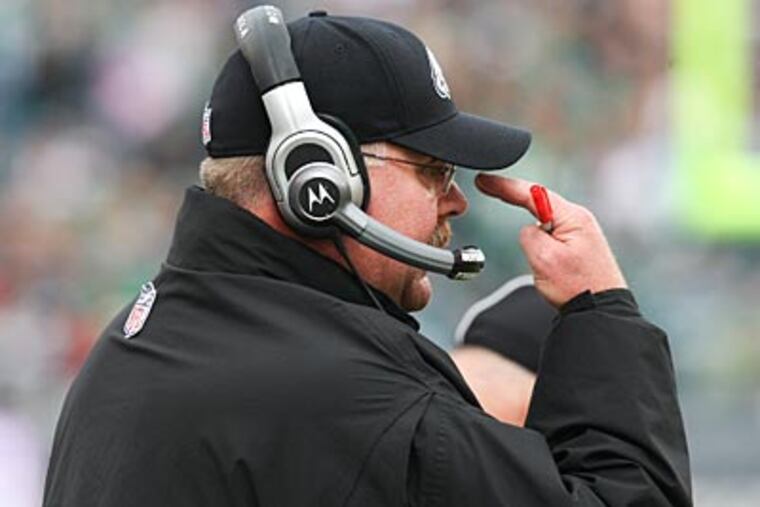 Andy Reid and the Eagles lost their third straight game on Sunday. (Steven M. Falk/Staff Photographer)