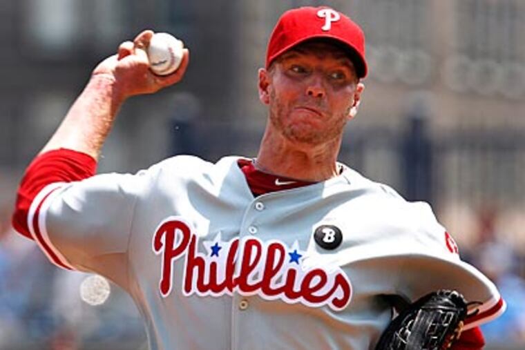 Roy Halladay allowed two runs on seven hits in seven innings. (Gene J. Puskar/AP)