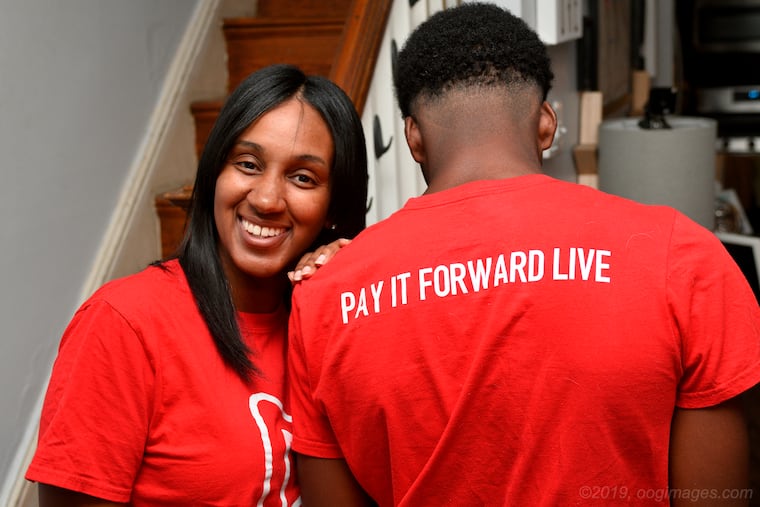 Shari Smith-Jackson and the inspiration for the Pay It Forward Live app she has cofounded, her 16-year-old son Shamar Smith.