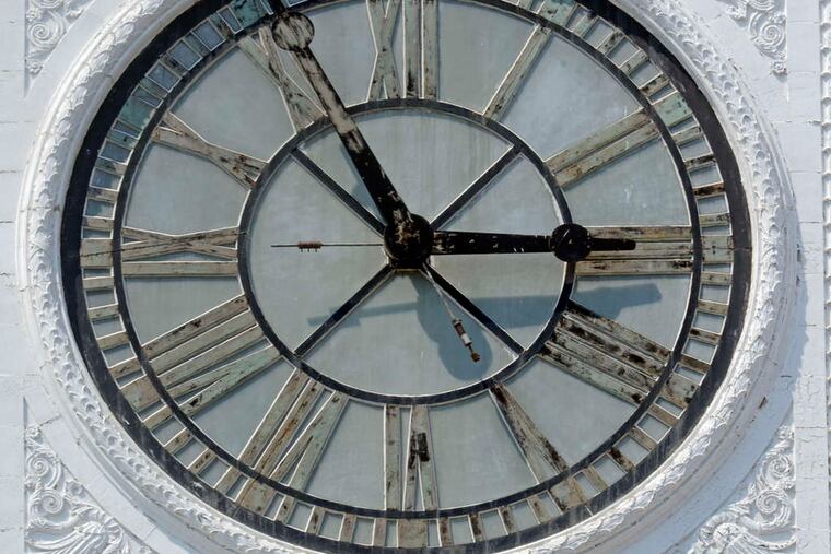 File: One of four clock faces on the Tower at Broad & Callowhill, home of The Inquirer since 1925. TOM GRALISH / Staff Photographer