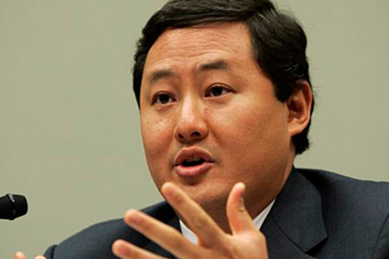 In this June 26, 2008 file photo John Yoo, a law professor at the University of California at Berkeley, testifies on Capitol Hill in Washington. Justice Department officials have stopped short of recommending criminal charges against Bush administration lawyers who wrote secret memos approving harsh interrogation techniques of terror suspects. (AP Photo/Susan Walsh, File)