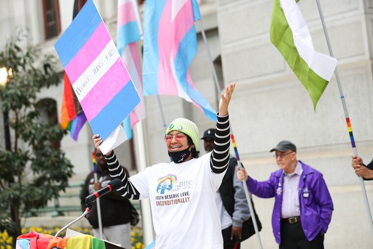 Alex Brunson speaks during a rally for trans lives at City Hall in Philadelphia on Friday, March 31, 2023. March 31 is the annual Trans Day of Visibility.