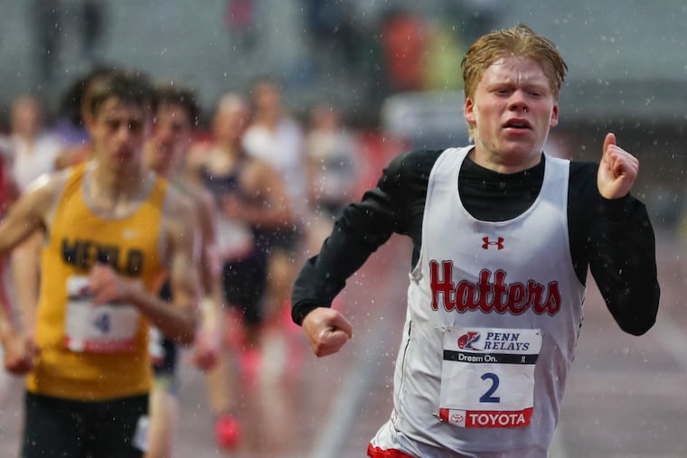 Brian DiCola of Hatboro-Horsham leads the pack as he competes in the High School Boys’ Mile Run Championship on the second day of the 2023 Penn Relays at Franklin Field in Philadelphia on Friday, April 28, 2023.