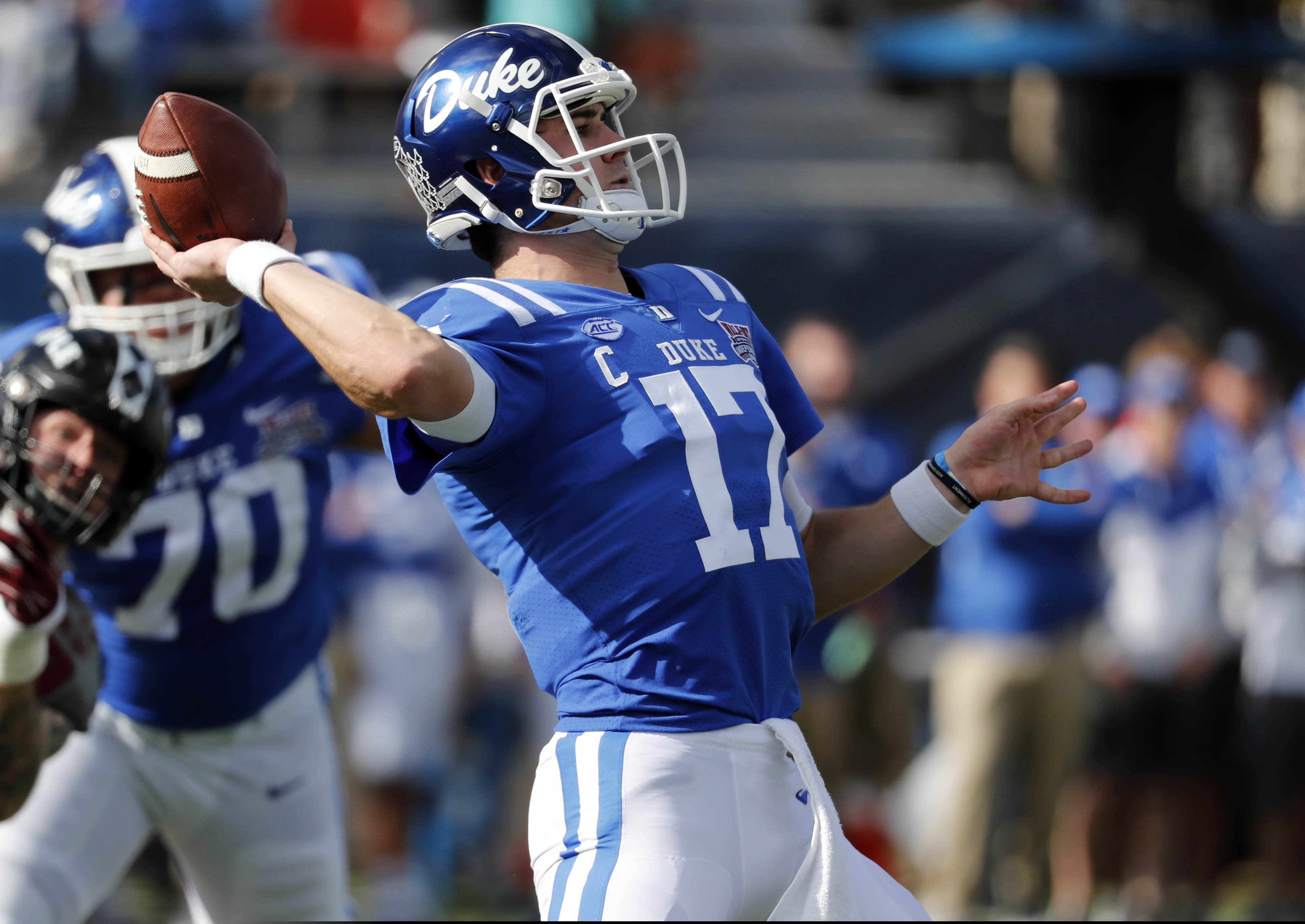 Duke quarterback Daniel Jones (17) sets to pass against Temple during the first half of the Independence Bowl, an NCAA college football game in Shreveport, La., Thursday, Dec. 27, 2018. (AP Photo/Rogelio V. Solis)