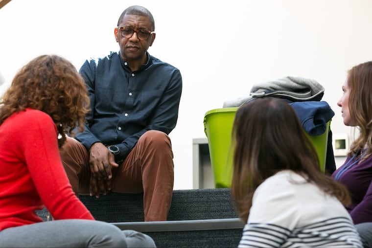 Howard Stevenson listens to teachers Monday at the Benchmark School in Media, where he teaches them how to address conflicts and conversations that revolve around race.
