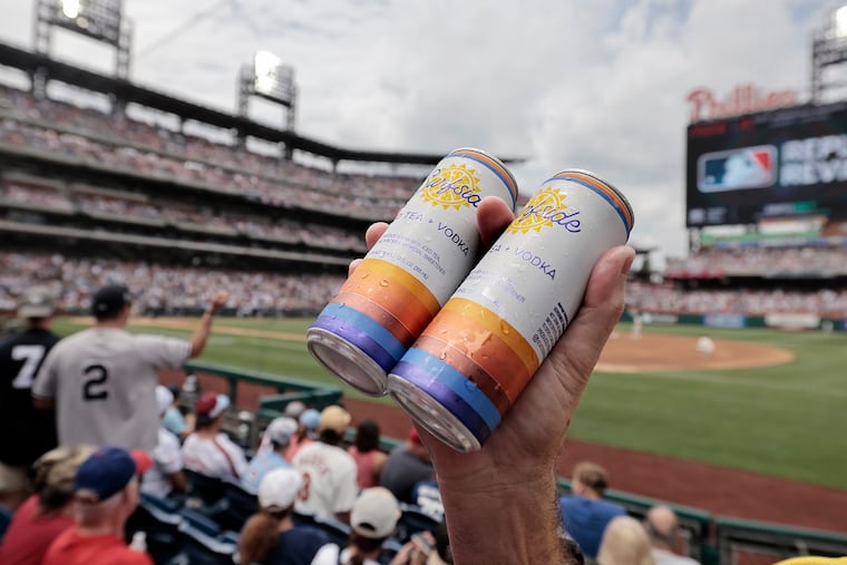 Hawker John Culin sells Surfside canned cocktails during a Phillies game at Citizens Bank Park in 2024. Surfside canned cocktails led the Phillies' stadium drink sales last year.