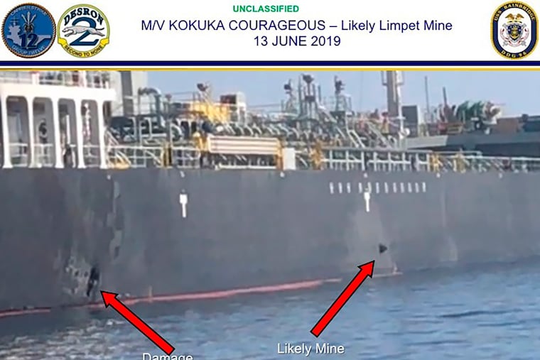 This June 13, 2019, image released by the U.S. military's Central Command, shows damage and a suspected mine on the Kokuka Courageous in the Gulf of Oman near the coast of Iran. The U.S. military on Friday, June 14, 2019, released a video it said showed Iran's Revolutionary Guard removing an unexploded limpet mine from one of the oil tankers targeted near the Strait of Hormuz, suggesting the Islamic Republic sought to remove evidence of its involvement from the scene. (U.S. Central Command via AP)