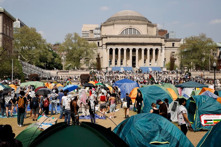 Student protesters gather inside their encampment on the Columbia University campus in April 2024.