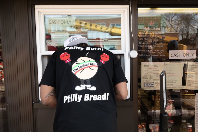 Dom Rivers places an order at Dalessandro's in Roxborough while wearing gear from JSP and Amoroso's Extra Collection.