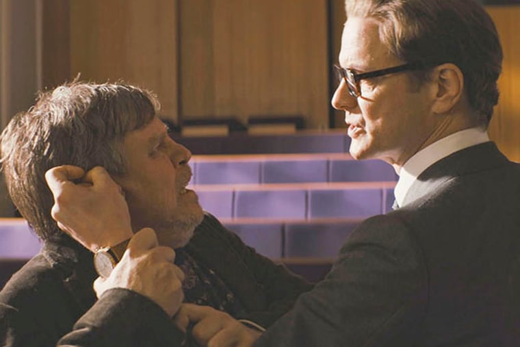 Colin Firth has Mark Hamill by the ear in a scene from "Kingsman: The Secret Service." (20th Century Fox)