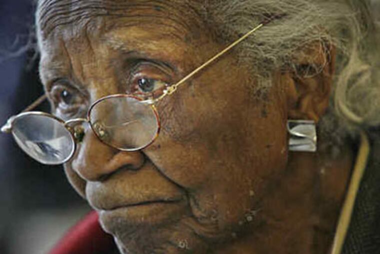 The residents of Opportunity Tower III waited a long time for yesterday's historic moment, but none longer than 103-year-old Viola Walker. (Alejandro Alvarez / Staff Photographer)