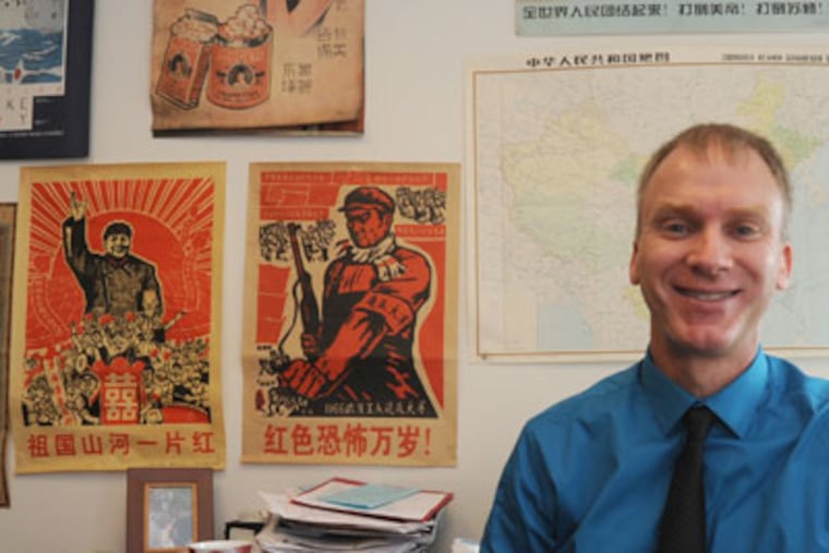 James Carter in his office. He is a contributor to "Chinese Characters."