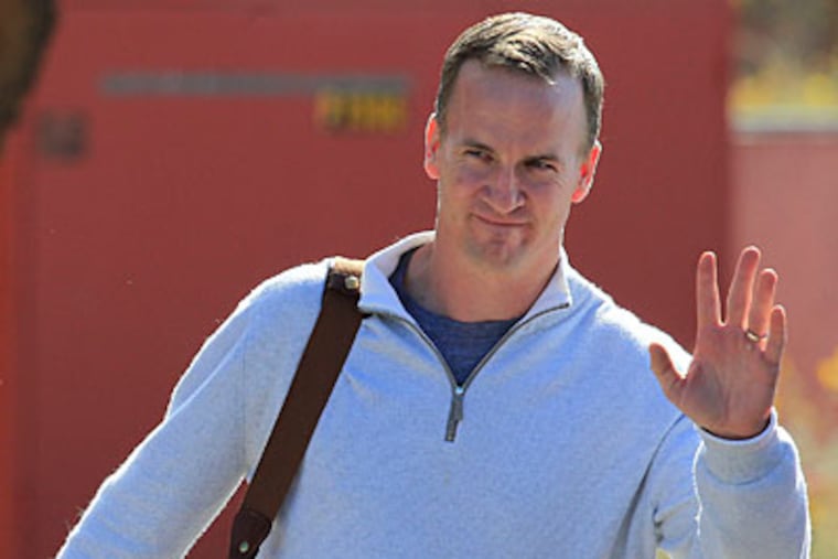 The Peyton Manning saga has been the biggest free agency news this offseason. (Ross D. Franklin/AP)