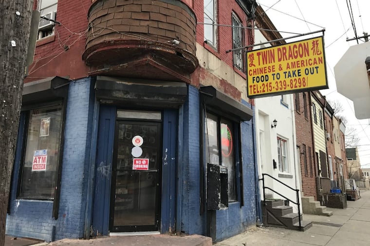 The Twin Dragon Chinese takeout, at 27th and Dickinson Streets in South Philadelphia, where a 17-year-old boy was shot in the head and critically injured about 9:15 p.m. Tuesday, Dec. 19, 2017. The shooter fired a bullet from outside that went through the takeout’s front glass door and hit the victim who was inside.