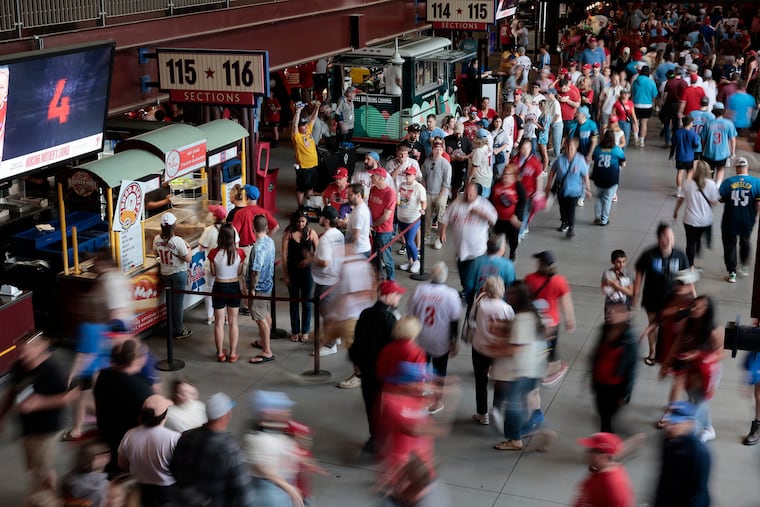 Fans wait in line to buy hot dogs during Hatfield Phillies Franks BOGO Night at Citizens Bank Park on Tuesday, April 29, 2025.
