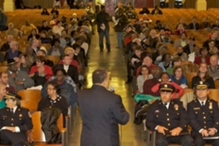Ramsey, with commanders at hand, at Monday's community meeting in South Philadelpha. After four meetings last week, Ramsey has two this week, in Wynnefield and in East Germantown.