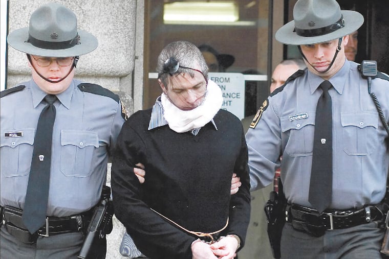 Serial killer Charles Cullen is led from the Lehigh County Courthouse in Allentown in March 2006 after receiving six life sentences for murders he committed in Pennsylvania.
