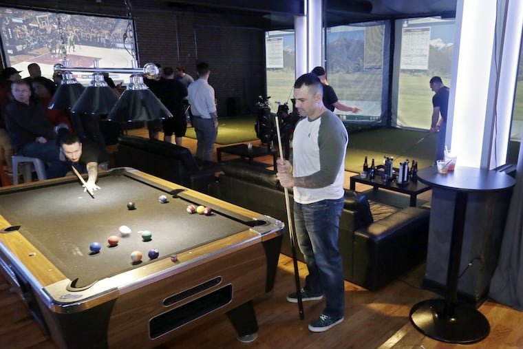 Some folks choose billiards while others use the golf simulators or watch the NBA playoffs upstairs at Golf & Social.