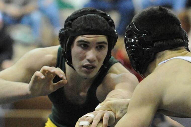 Clearview High's Edward Lenkowski (left) faces off against Delsea
Regional's John Hennelly in their 152 lb. match Jan. 9, 2013 at
Clearview. Lenkowski won the match 4-3 but Delsea Regional won the
overall match 33-30. (Clem Murray/Staff Photographer)