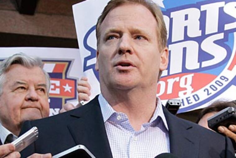 Roger Goodell talks to reporters after the NFL Players Association decertified the union. (J. Scott Applewhite/AP Photo)