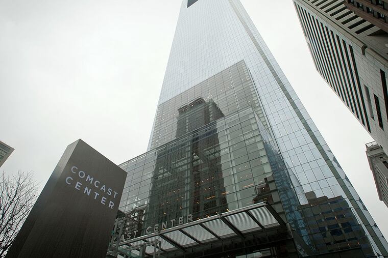 The Comcast Center looms large in Center City. Comcast's reach will face new scrutiny April 9 as a Senate committee begins hearings on the company's proposed Time Warner Cable purchase. RON TARVER / Staff Photographer