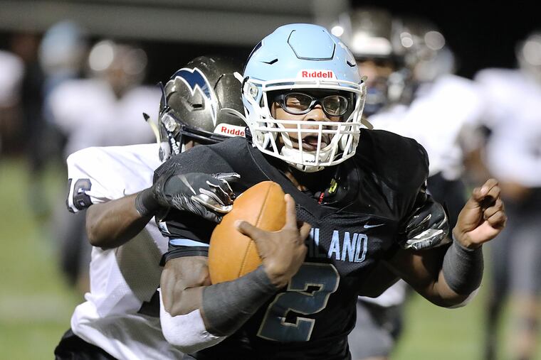 Johnny Martin runs against Timber Creek. Relationships are important to him in the recruiting process.