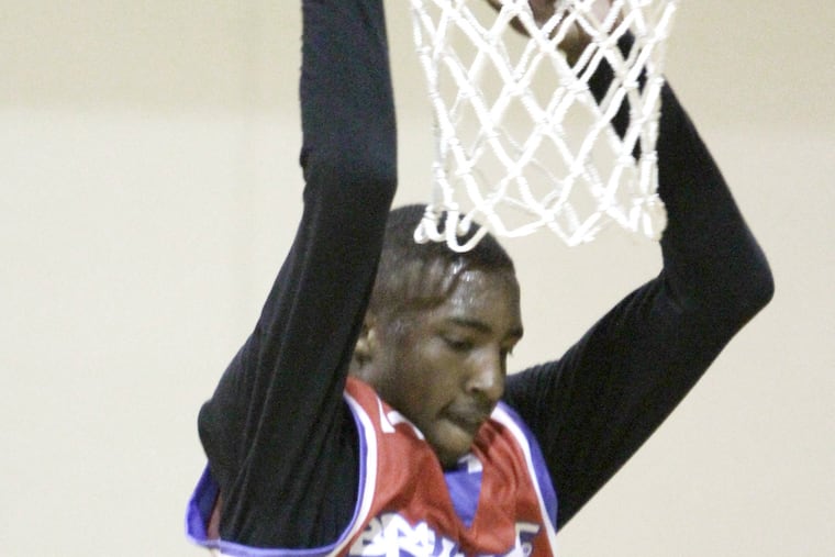 Carroll’s Derrick Jones dunks at Reebok Classic Breakout Camp.