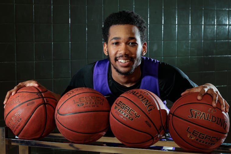 Roman Catholic's Semaj Robinson poses after practice on Jan. 30.