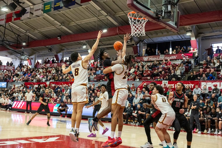 Dasear Haskins (center) led the Hawks with a career-high 24-point effort in Saturday's win over Loyola (Ill.) at Hagan Arena.
