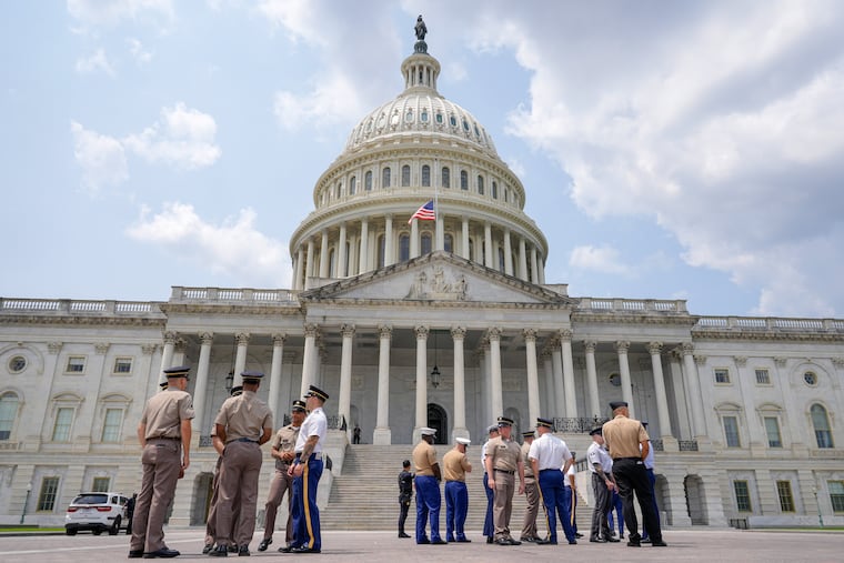 Members of the military stand outside of the U.S Capitol to practice for Sen. Lindsey Graham, R-S.C., is funeral ceremony, Monday, July 27, 2026, in Washington.