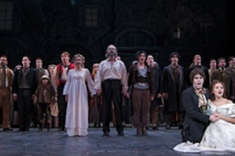 Company of "Les Misérables" at the Walnut Street Theatre. "The thing I wanted to do was to rediscover the heart of 'Les Miz,' director Mark Clements said. He worked with a cast of 36, including many local actors.