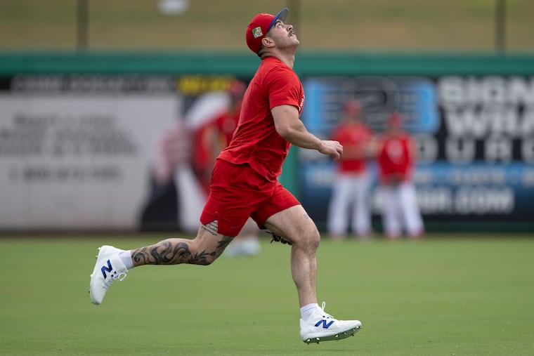 Otto Kemp takes fly balls in the outfield during a workout on Thursday in Clearwater, Fla.
