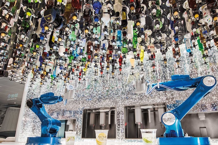 The Bionic Bar, an automated drink-making robot powered by artificial intelligence, is a feature of Royal Caribbean's newest cruise ship, Wonder of the Seas.