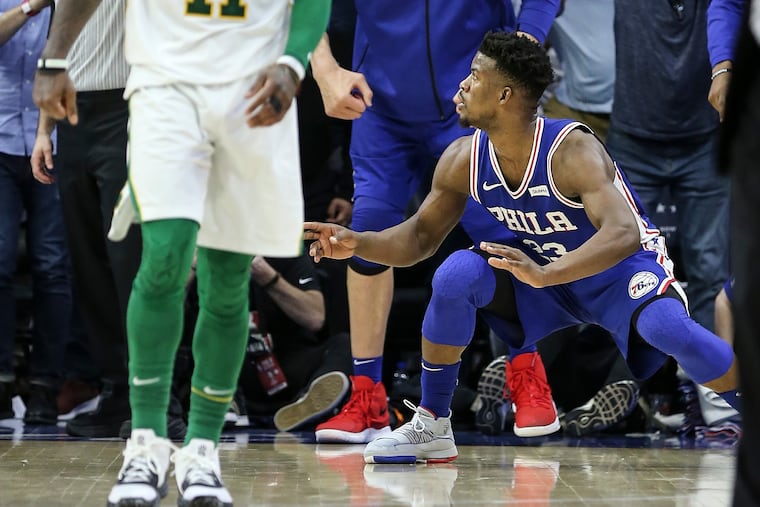 Jimmy Butler celebrates after hitting his big shot that sealed the Philadelphia 76ers' 118-115 win over the Boston Celtics at the Wells Fargo Center on Wednesday night.