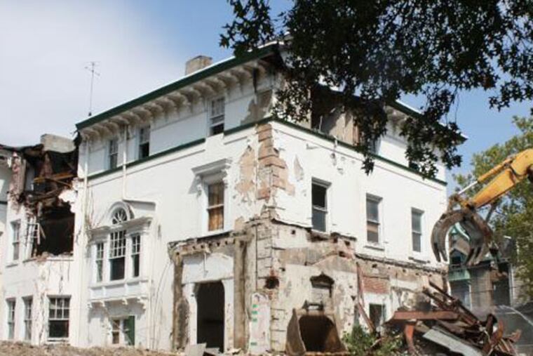 A historic building at the southwest corner of 40th and Pine streets is being demolished to make way for apartments for University of Pennsylvania graduate students. (Photo courtesy of PlanPhilly)
