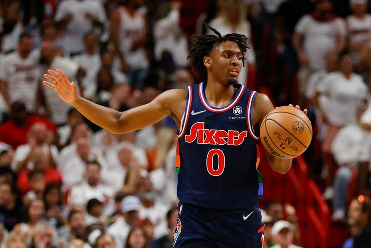 Sixers guard Tyrese Maxey dribbles the basketball against the Miami Heat during the second-round Eastern Conference playoffs.