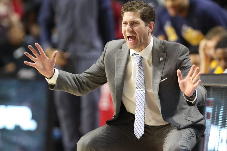 Head Coach Zach Spiker of Drexel encourages his team on against Temple at the Liacouras Center on Dec. 16, 2017.
