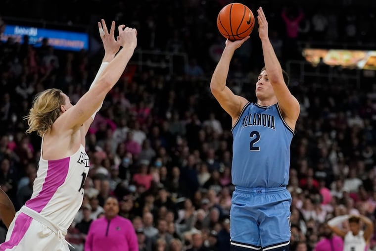 Villanova guard Collin Gillespie shoots over Providence forward Noah Horchler.
