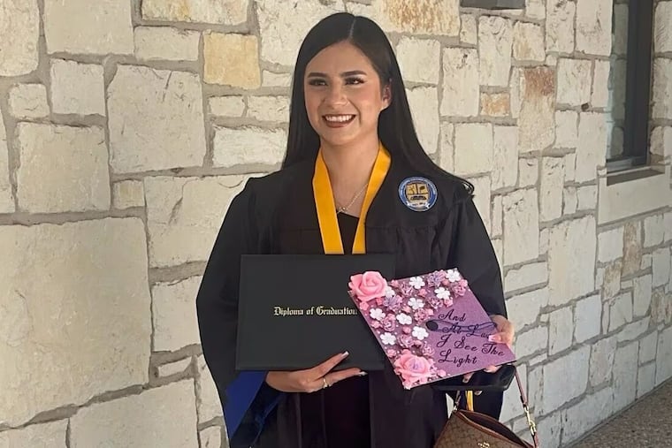 In this undated photo provided by her attorney, Any Lucia Lopez Belloza celebrates her high school graduation in Texas.