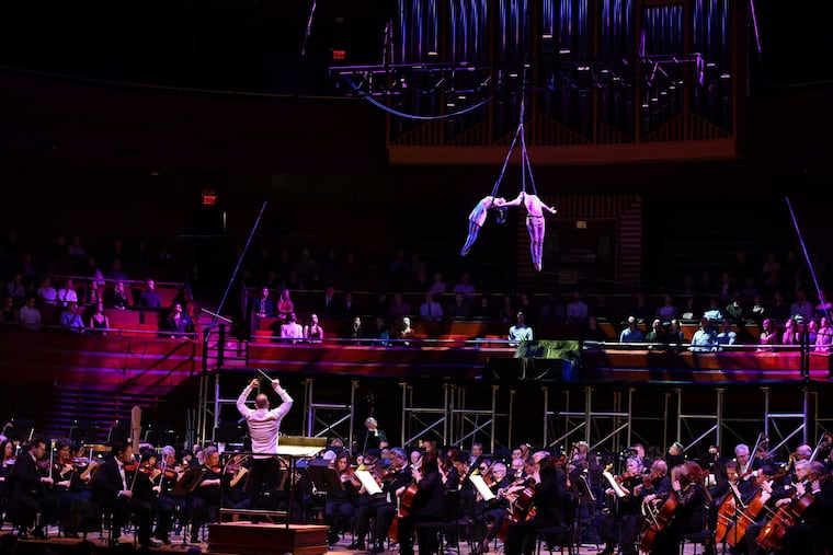 Yannick Nézet-Séguin conducts the Philadelphia Orchestra as Brian Sanders' JUNK dancers Julia Higdon (Juliet) and Teddy Fatscher (Romeo) fly above.