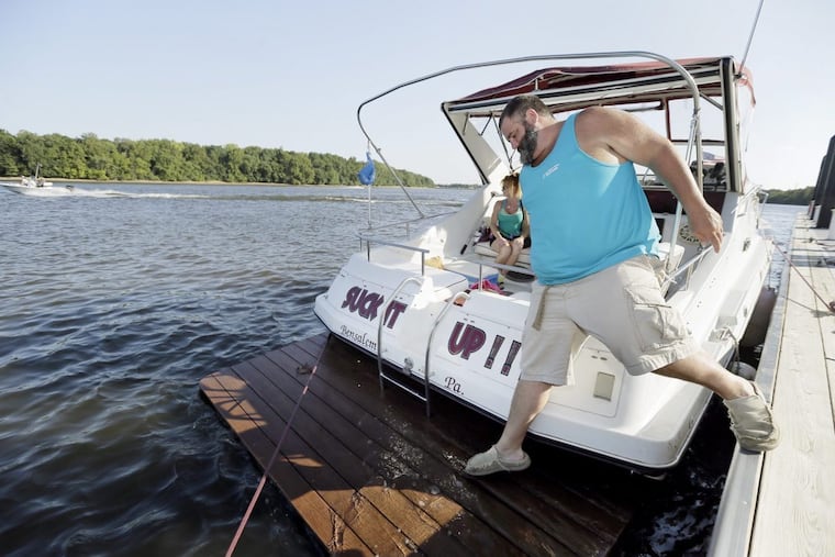 Rich Cordisco, a Bristol Borough native, boards his 31-foot SunRay Corsaro at the revitalized town’s new $3M Delaware River waterfront docks.