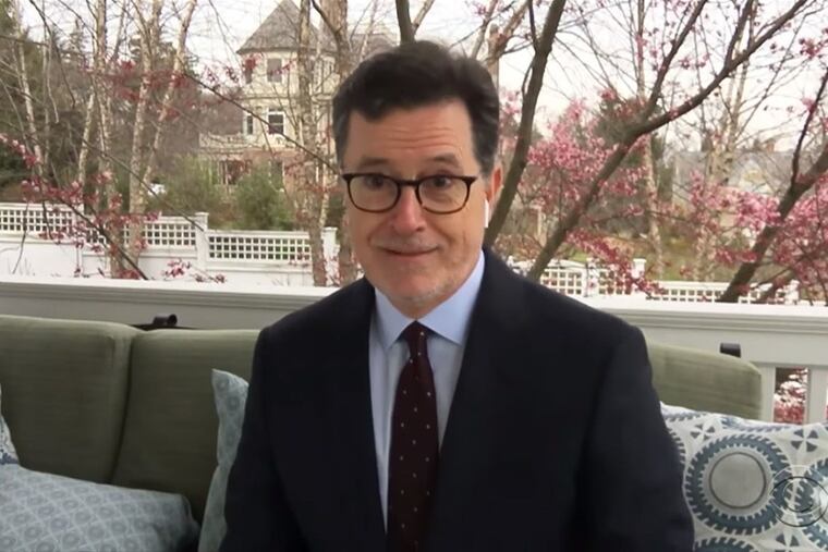 CBS "Late Show" host Stephen Colbert delivers a monologue from the porch of his Montclair, N.J., home. Late-night TV shows first banished their audiences, and then sent their staffs and hosts home, but the hosts have been finding ways to keep going amid this time of social distancing.
