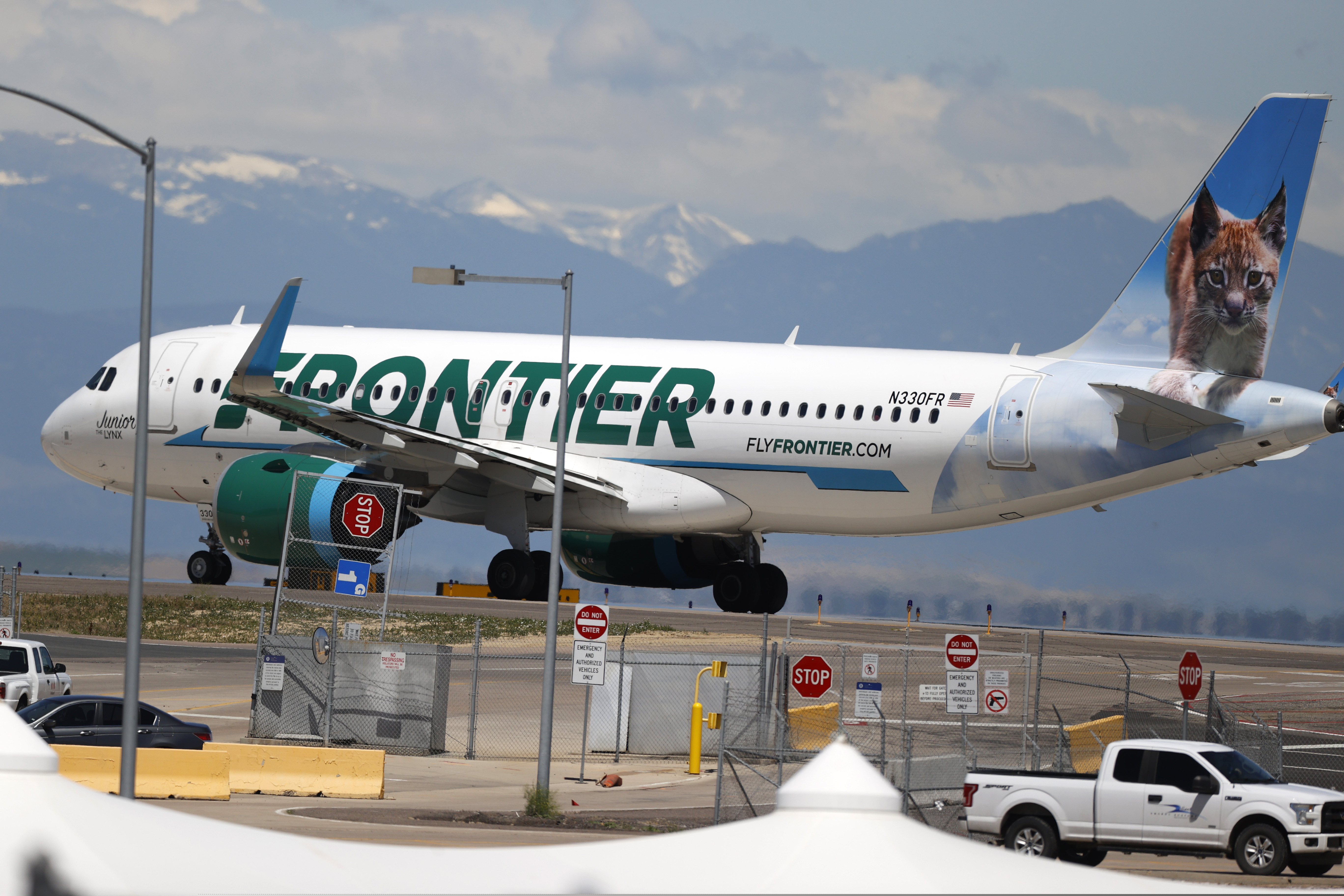A 22-year-old Ohio man was arrested Sunday morning on three counts of battery after a Frontier Airlines flight from Philadelphia to Miami.