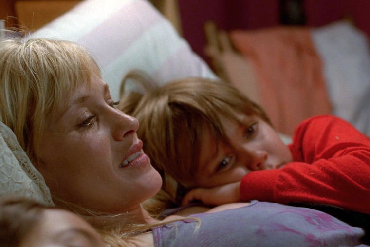 Mason (Ellar Coltrane) and mother Olivia (Patricia Arquette) are part of a Texan middle-class family in a film propelled by time going by. (IFC Films)