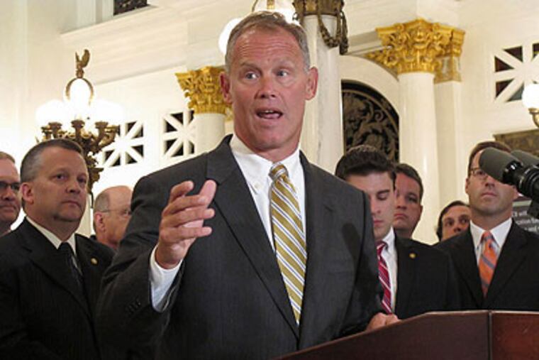 Pennsylvania House Majority Leader Mike Turzai, R-Allegheny, speaks at a Capitol news conference announcing details of a bill he plans to introduce to privatize sales of wine and liquor in Pennsylvania on Wednesday in Harrisburg. (AP Photo / Marc Levy)