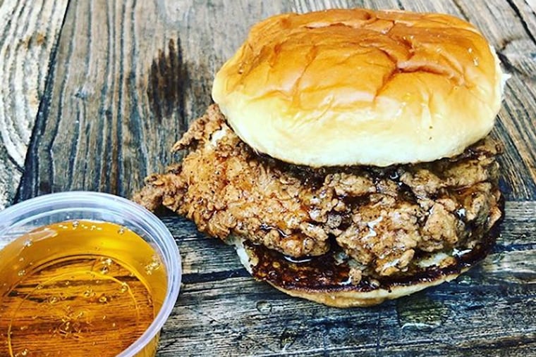 Buttermilk honey fried chicken on a warm, buttered King's Hawaiian roll at Hatch & Coop.